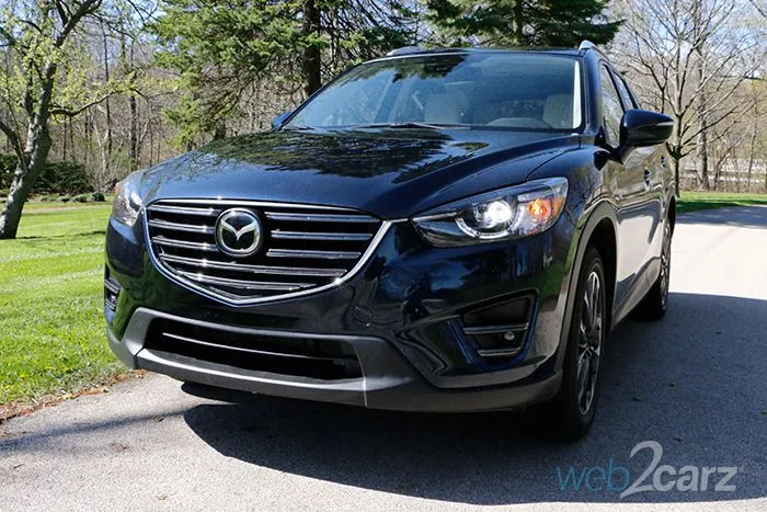 2016-mazda-cx-5-grand-touring_front_34_1463419004_700x467.jpg