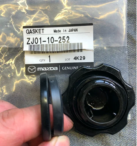 IMG_0559 Replaced Oil Filler Cap Gasket Old 5_5mm New 7_2mm LoRes.webp