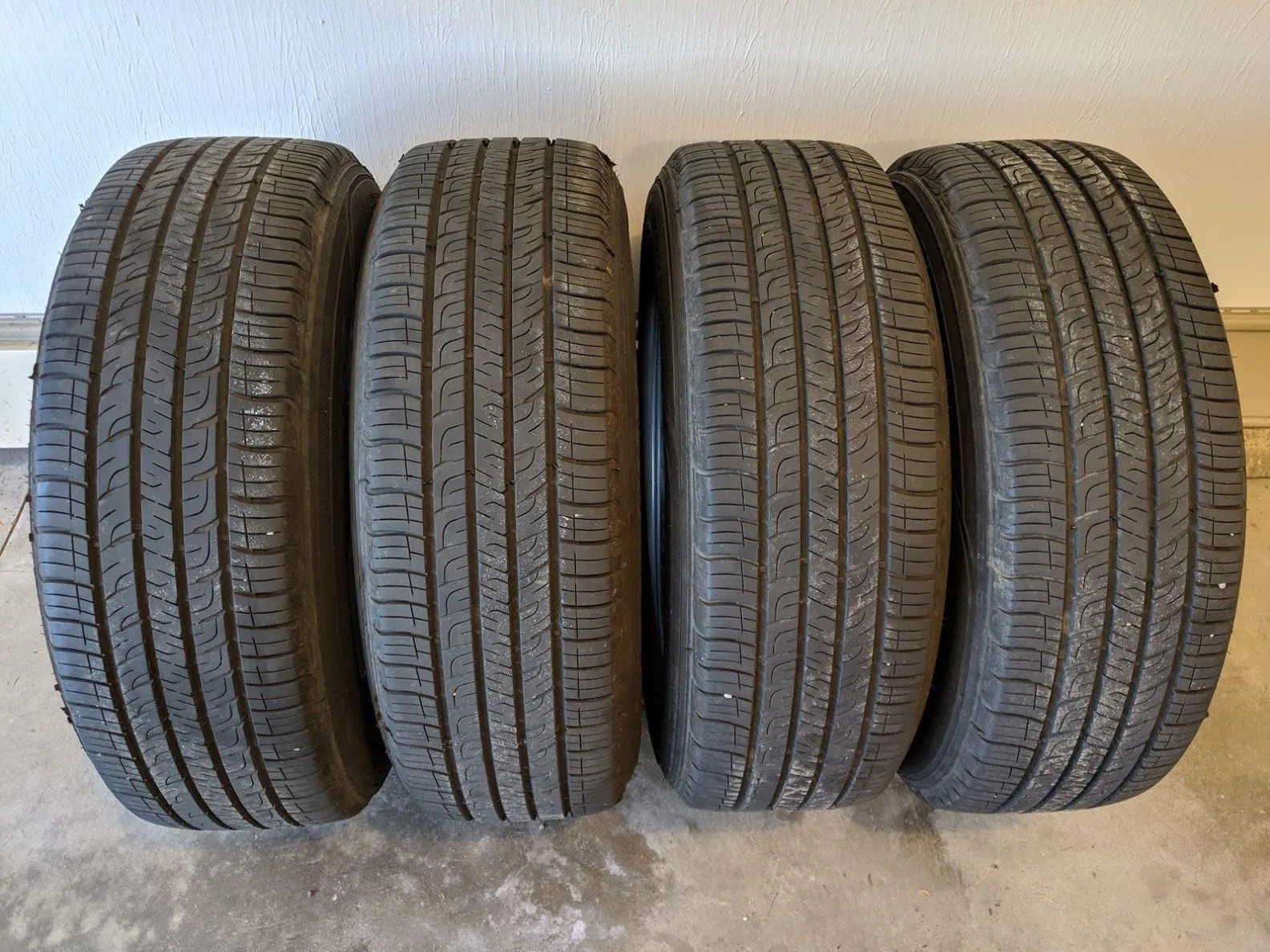 Four Goodyear Assurance ComfortTread Tires