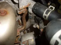 Upper and Lower Coolant Lines Closeup.webp