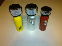 red yellow brushed cans.webp