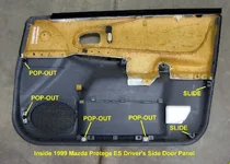 Inside 1999 Mazda Protege ES Driver's Side Door Panel.webp