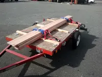 trailer with lumber.webp