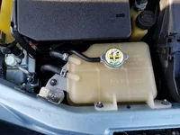 Emilia - Stock Nuts - Coolant Tank and AC Bracket.webp