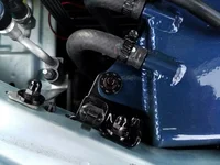 Emilia - OEM Coolant Tank Bracket - Powdercoated Gloss Black with Nissan Hood Rod Clip.webp
