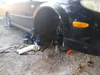 car jacked up.webp