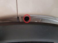 Remove 1 x  screw L and Right under plastic wheel arch decor.jpg