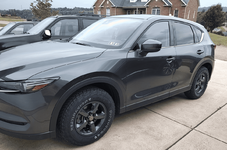 mazda with anthracite rims and AT tires 2.png