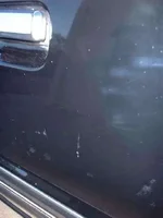 1984 Ford Mustang - BEFORE polishing hazy and faded door panel.webp