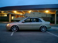 car with tank.webp