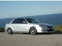 CRB85D FULLY PIMPN with blacked out numberl plates.webp