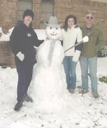 kids with snowman2.webp