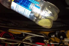 Ghetto catch can contents - looks like piss.webp