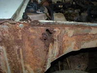 Mazda 1200 rust in front structure.webp