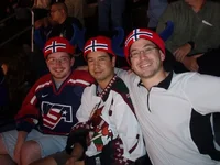 Guys at hockey game.webp