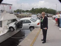 car-crashes-into-boat-weird-crash-pictures.webp