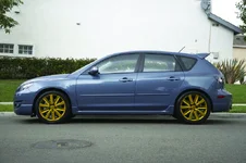 comsic blue gold wheels2.webp