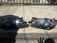 Angel eyes headlamps on floor.webp