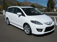 2010_Mazda5_3_quarters_white.webp