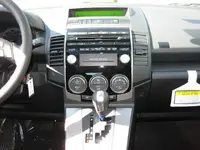 2010_Mazda5_Dashboard_Black_Piano_3.webp