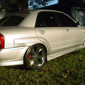 deans car front yard corner.JPG