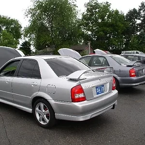 group leaders open hoods.webp