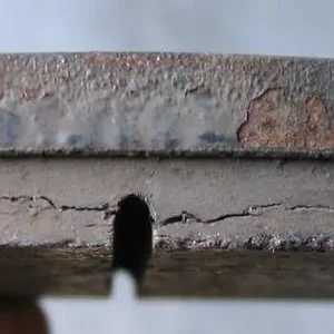 OEM_Front_Pad_Cracked_Top.webp