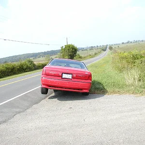 CAR IN DITCH.webp