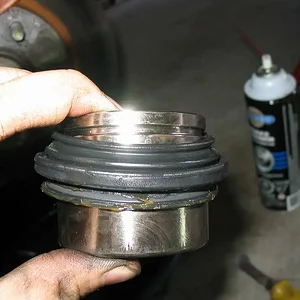 18 After Cleaning and Lubing - Put Dust Seal Over Piston.webp