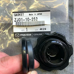 IMG_0559 Replaced Oil Filler Cap Gasket Old 5_5mm New 7_2mm LoRes.webp