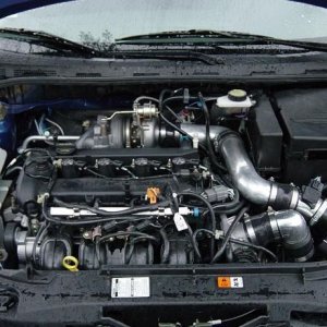 Engine in MZ3 with turbo.JPG