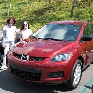 Wife and Daughter with CX-7.jpg