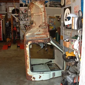 Mazda 1200 cab in shop.JPG