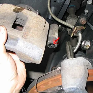 06 Drivers Front Caliper Removed From Slider.jpg