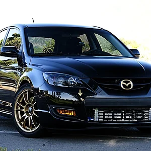 Ian & Mazda 3.jpg