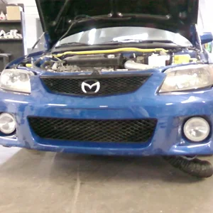 exterior frnt bumper repair, headlights buffed.jpg