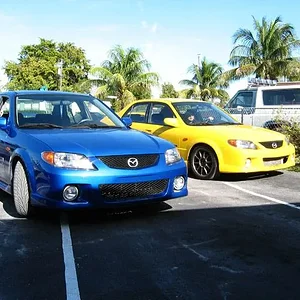 mazda mp3 '02 yellow and blue.jpg
