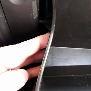 2017 CX-5 Cabin Air Filter Repalcement_Push in on glove box tabs.jpg