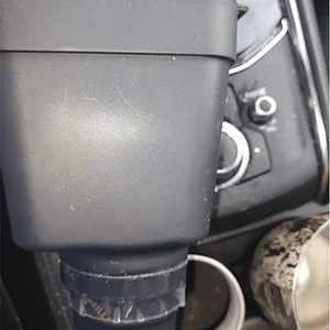 cup holder trash can with carpet and tape.png