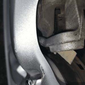 fully exrtended CX5 caliper with mazda tribute 16 inch rim.png