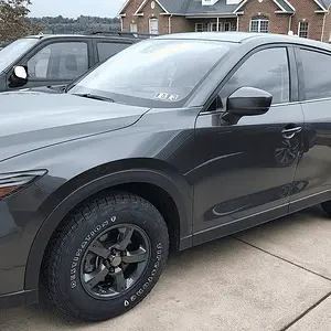 mazda with anthracite rims and AT tires 2.png