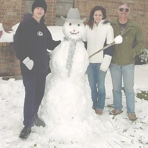 kids with snowman2.webp