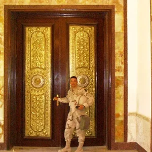 four heads, gold plated doors.webp