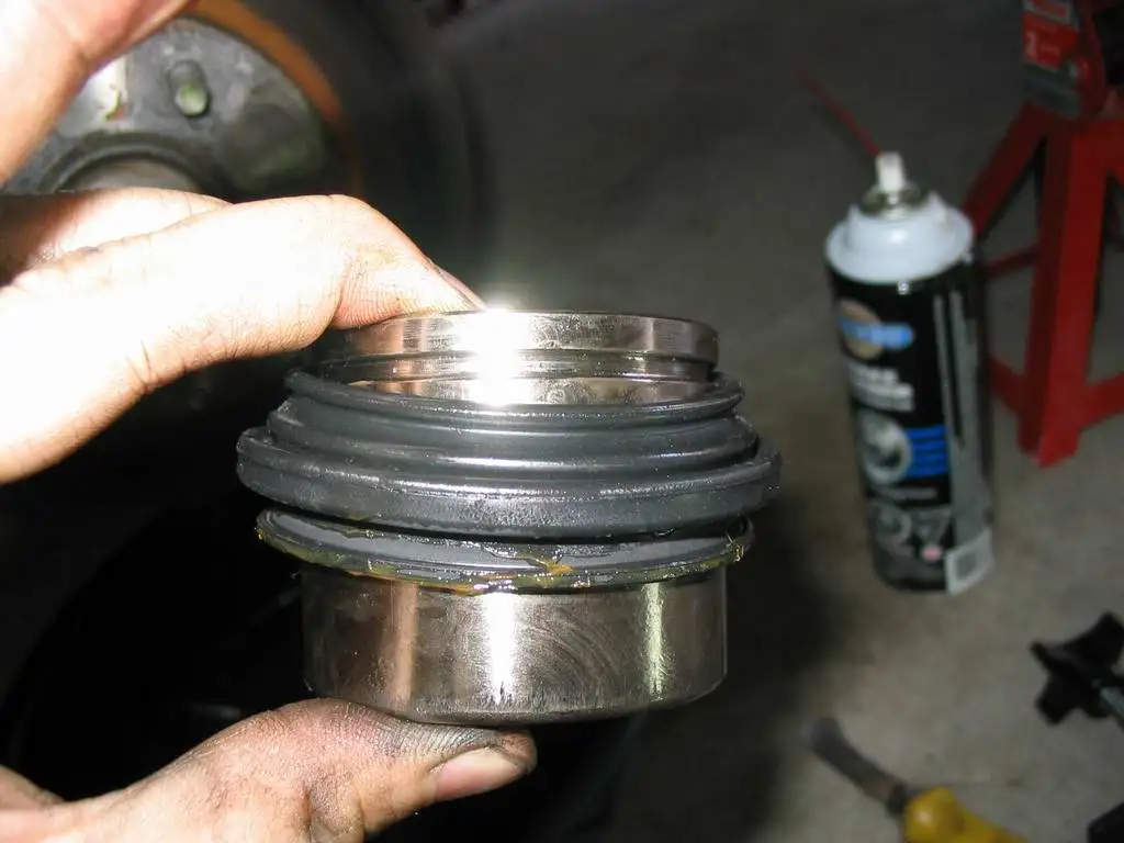 18 After Cleaning and Lubing - Put Dust Seal Over Piston.webp