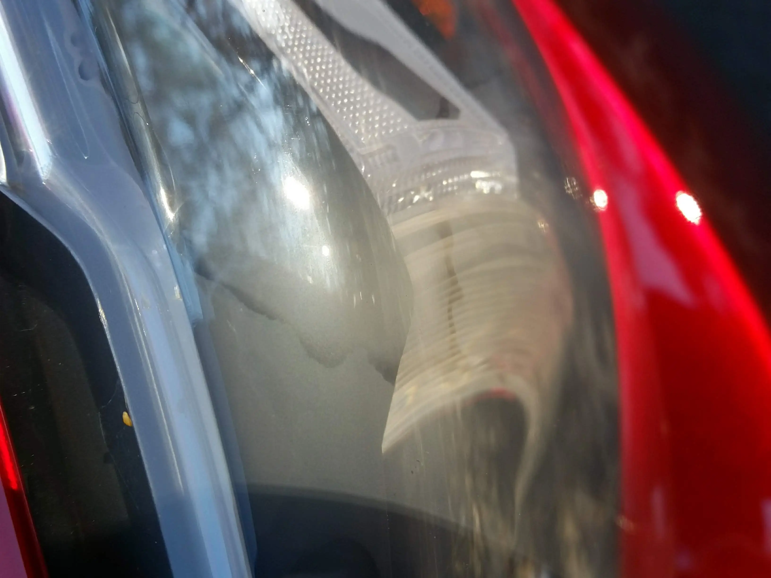 2017 CX-5 Headlight Milky Deposit 1.jpg