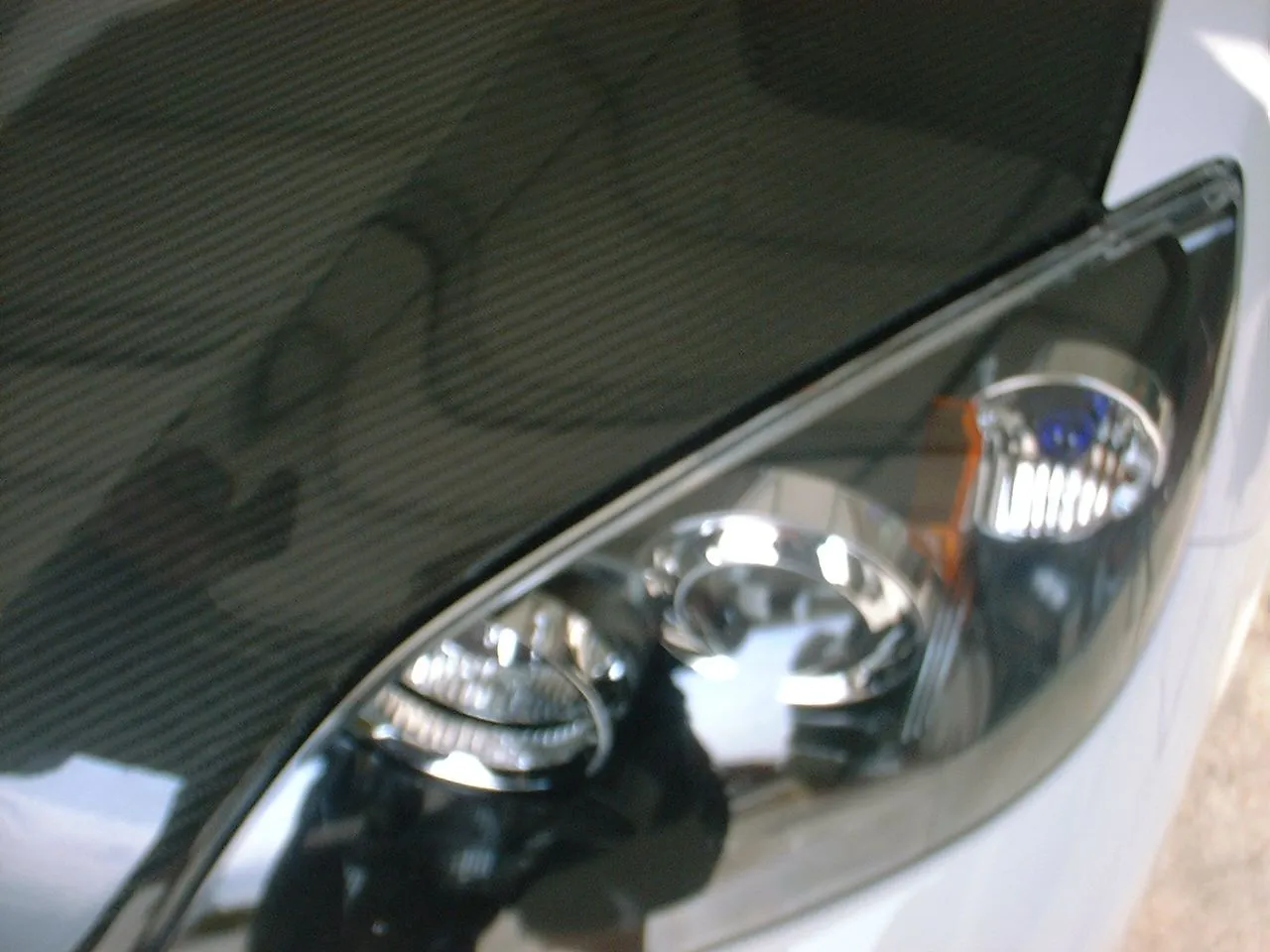 3-hood, molding(headlight).JPG