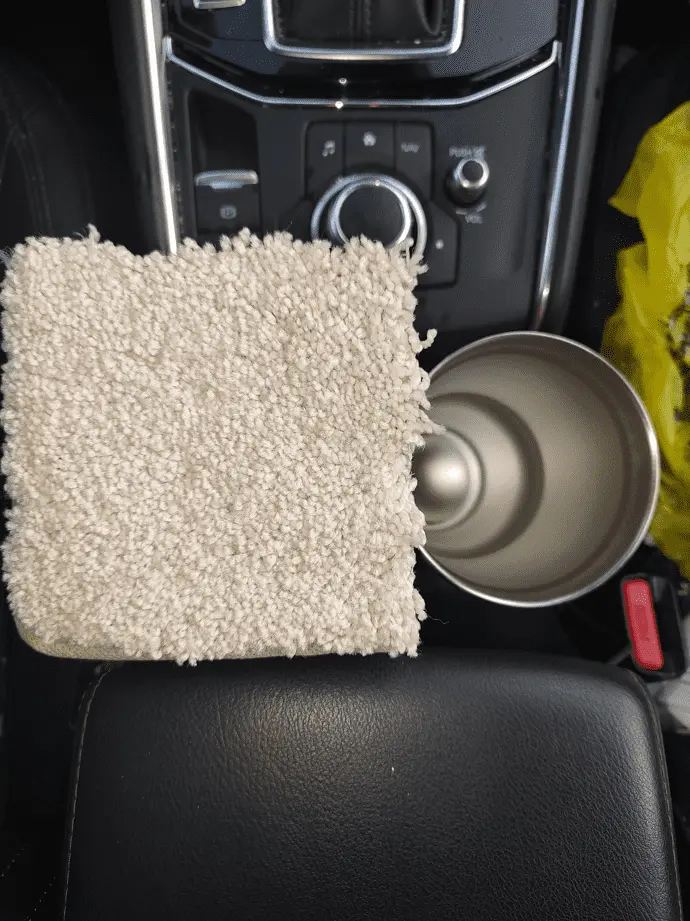cupholder trash can armrest top view.png