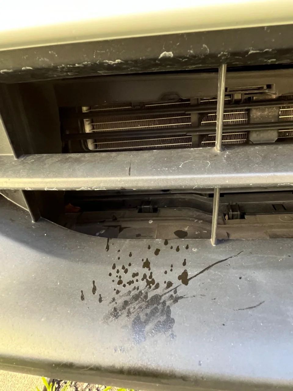 cx-5 bumper leak closeup.webp