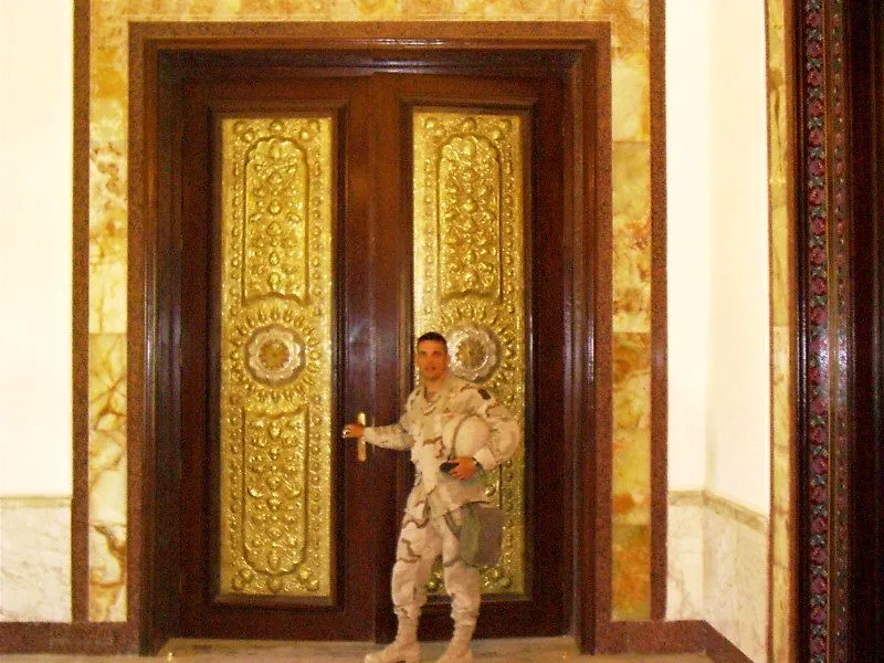 four heads, gold plated doors.webp