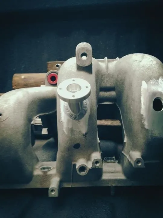 injector holders welded in.JPG